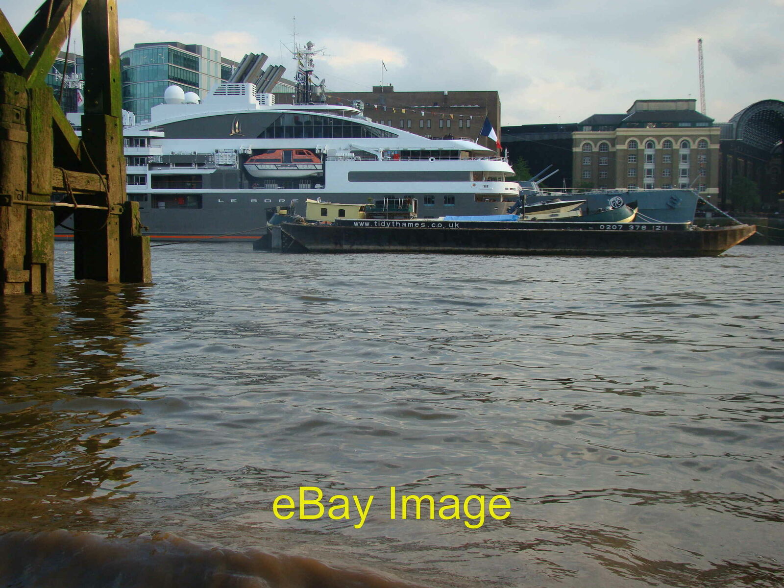 Photo 6x4 View of the Le Boreal and a barge from the Thames Beach London  c2014
