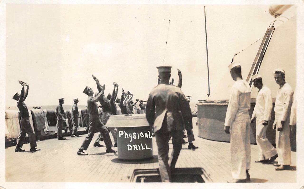 RPPC PHYSICAL DRILL SHIP MILITARY REAL PHOTO POSTCARD (c.1920s)