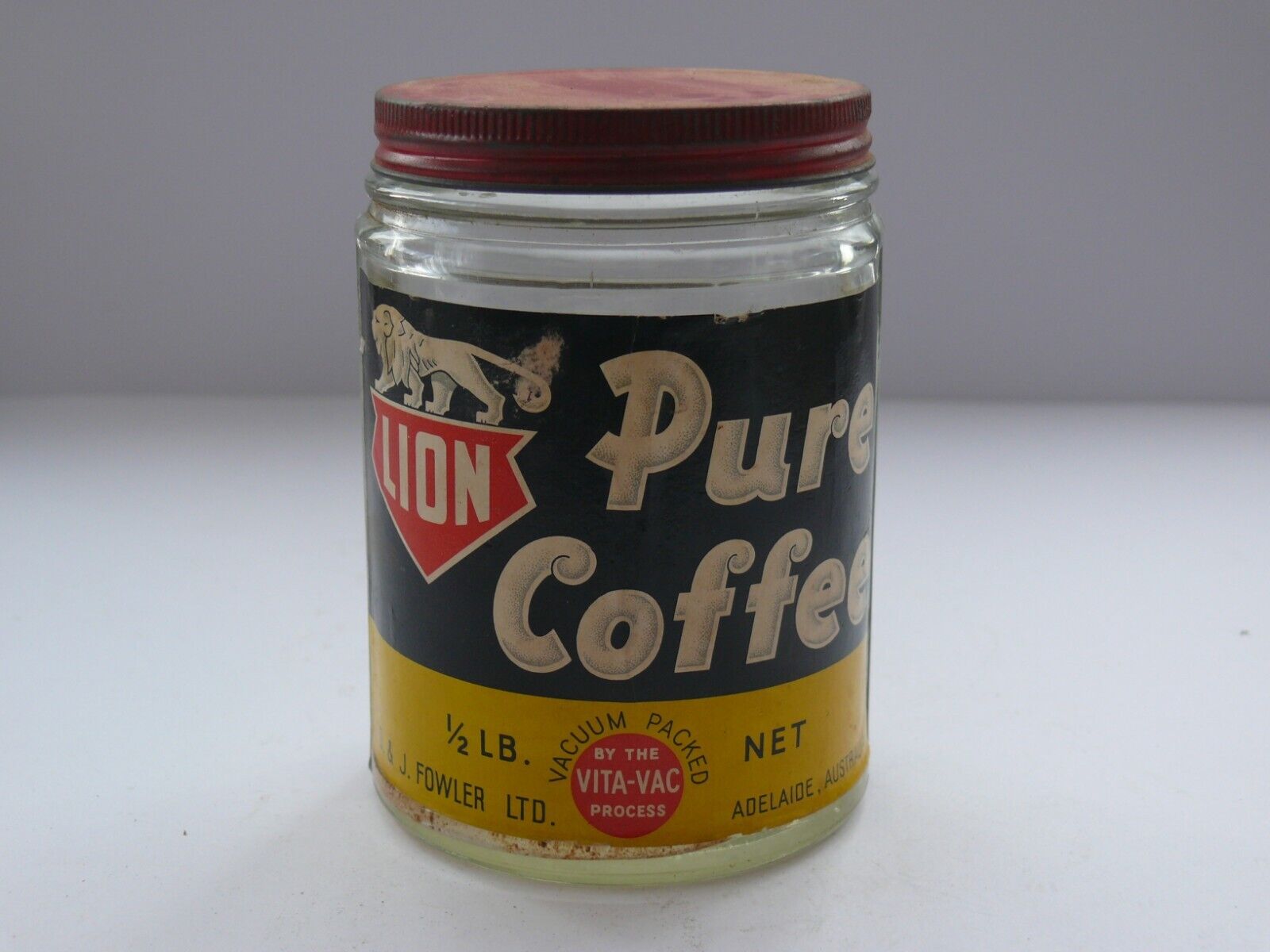 VINTAGE AUSTRALIAN LION BRAND 1/2LB PURE COFFEE JAR.