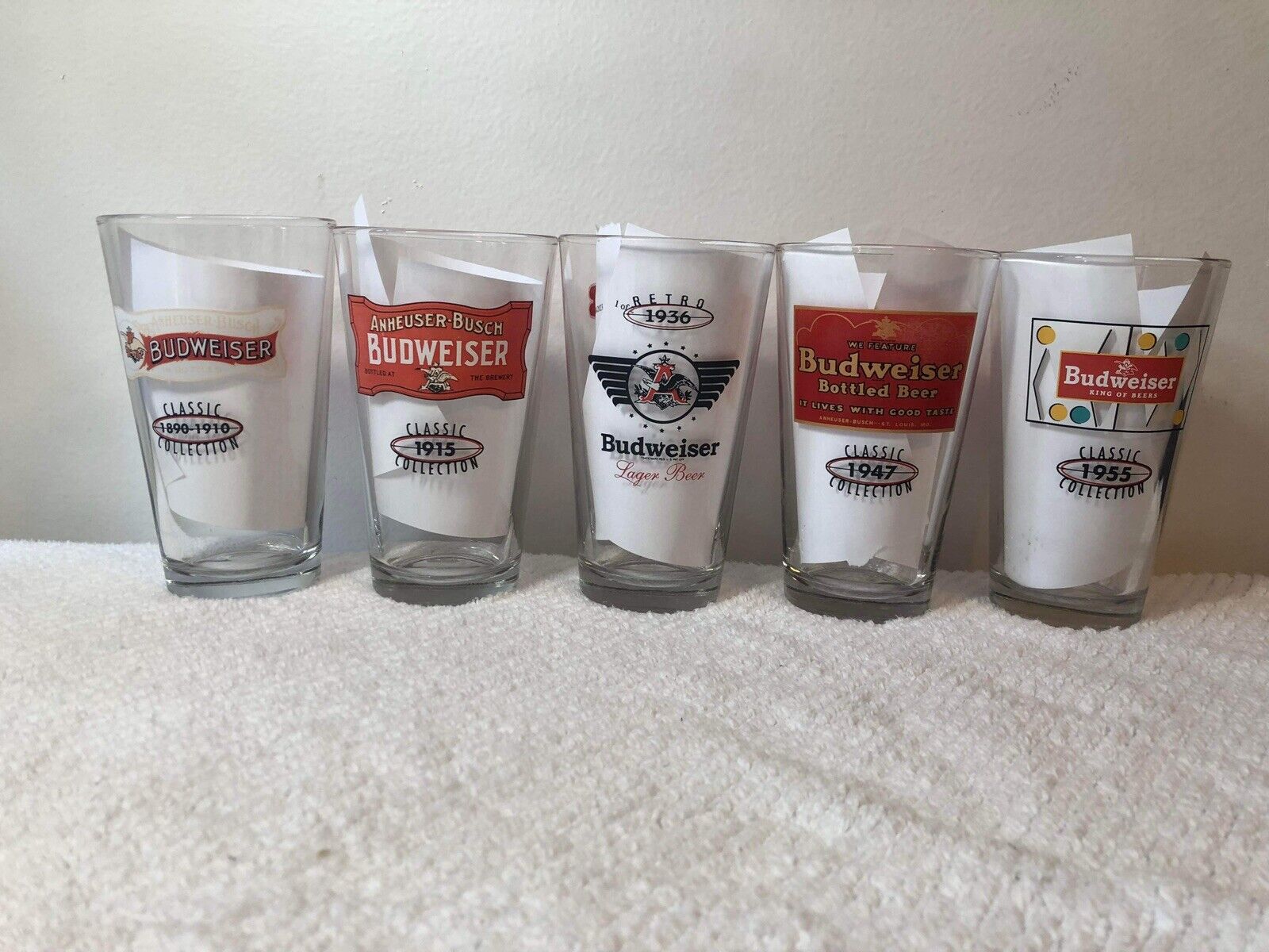 Budweiser Set Of 5 Logos Over The Years Pint Glasses 16oz W/Bonus Army Glass