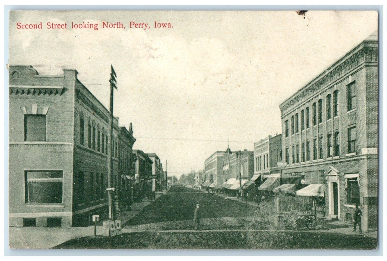 c1910 Second Street Looking North Buildings Road Perry Iowa IA Vintage Postcard