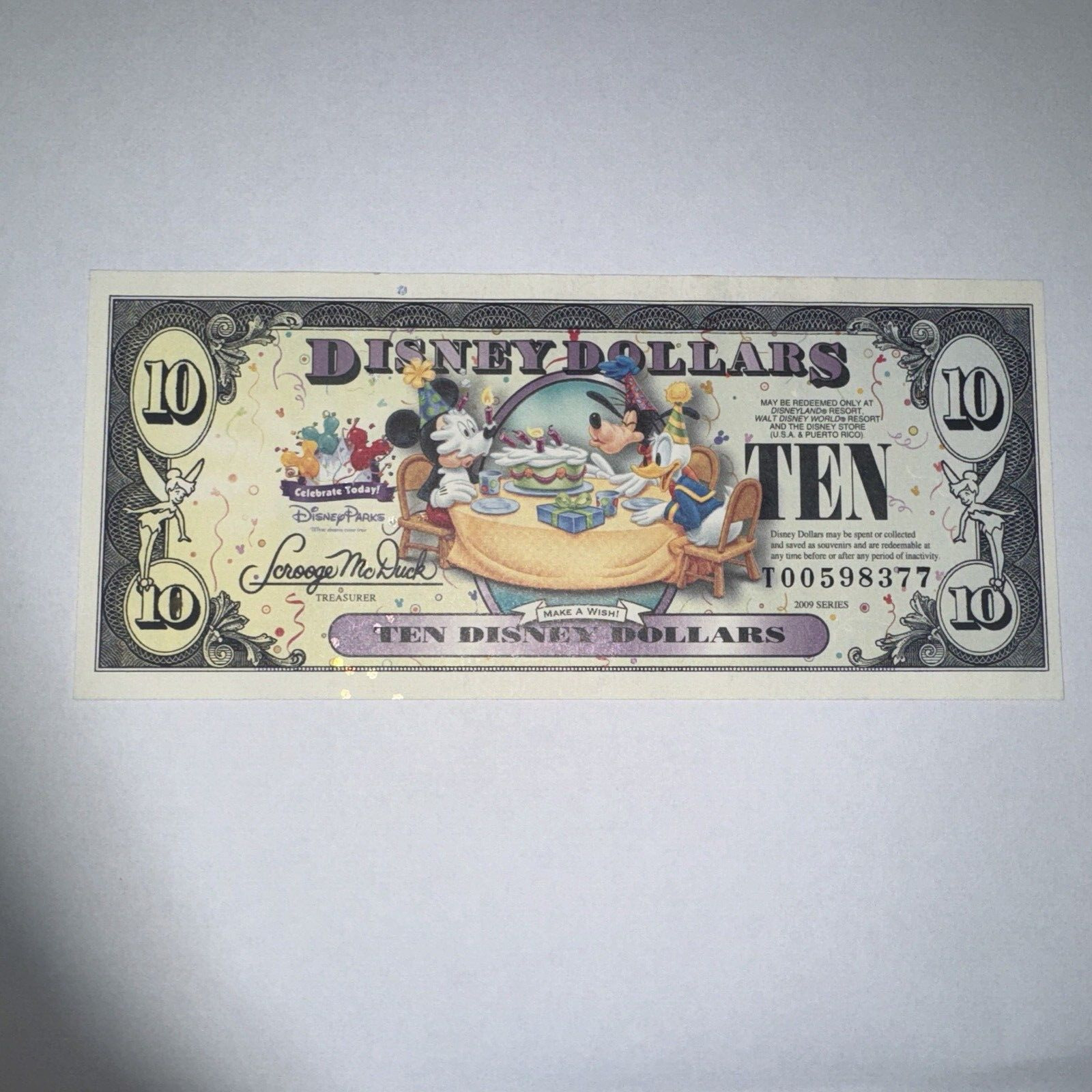 2009 $10 Ten Dollar Disney Mickey Goofy Donald Make a Wish Celebration T Block