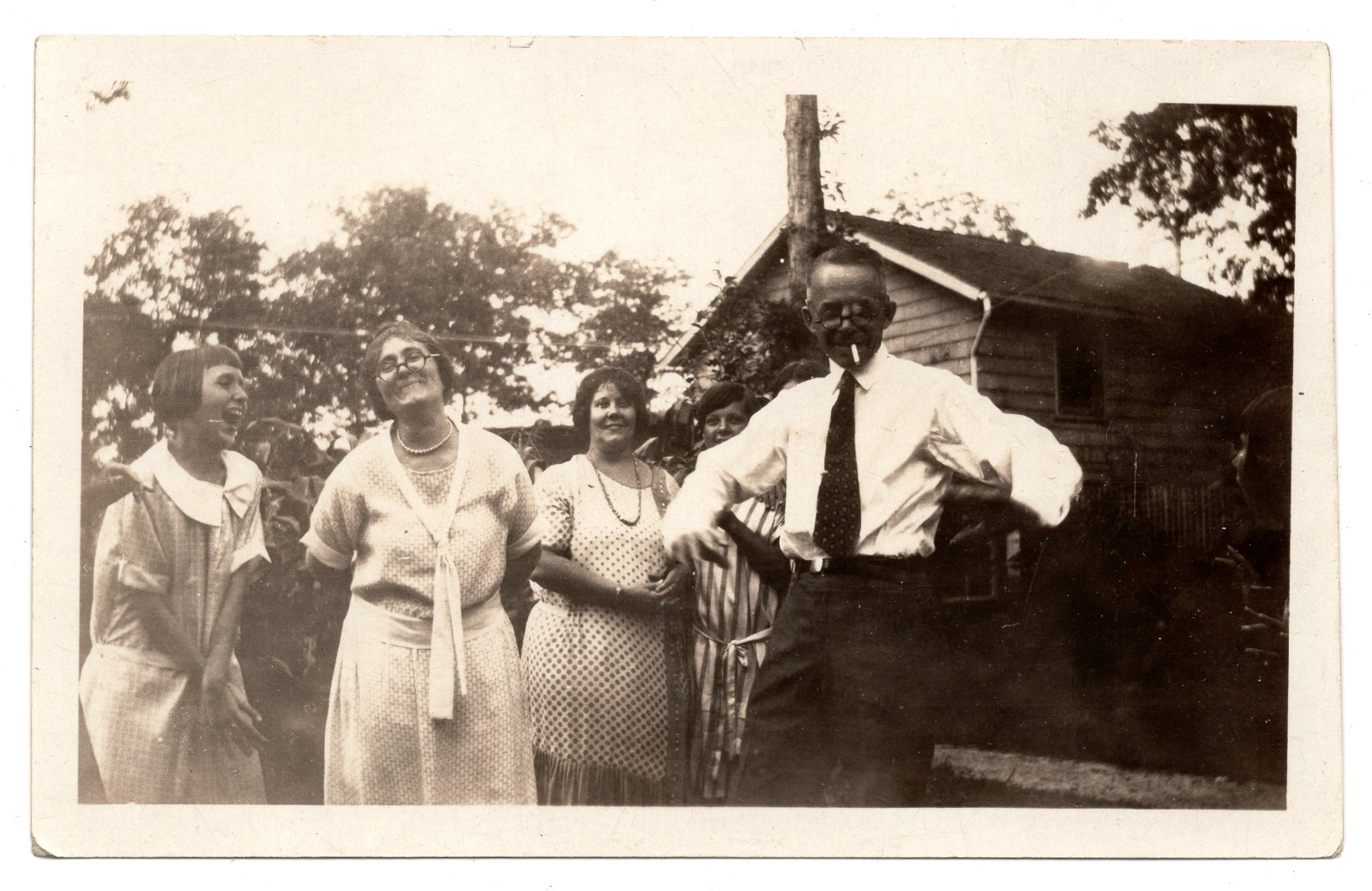 Antique/Vintage Snapshot of a Family Having Fun/Laughing