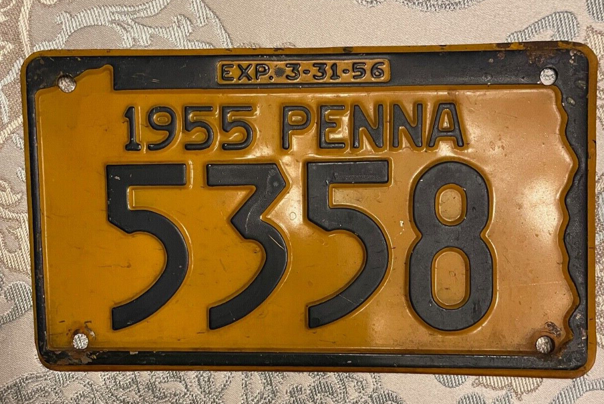Pair of vintage 1955 & 1955 Pennsylvania license plates blue & orange