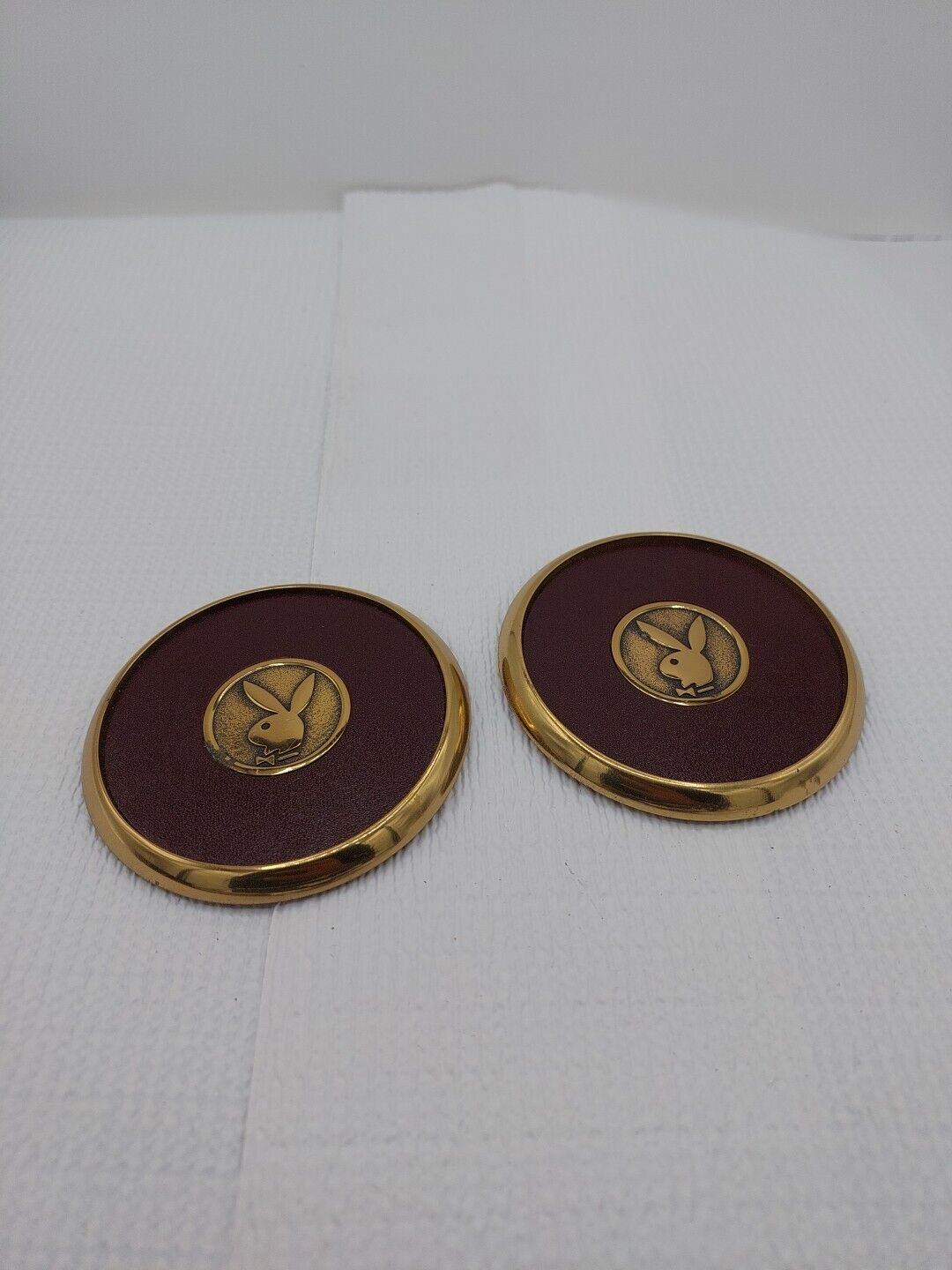 Lot of 2 Vintage Playboy Brass and Leather Beverage Coasters