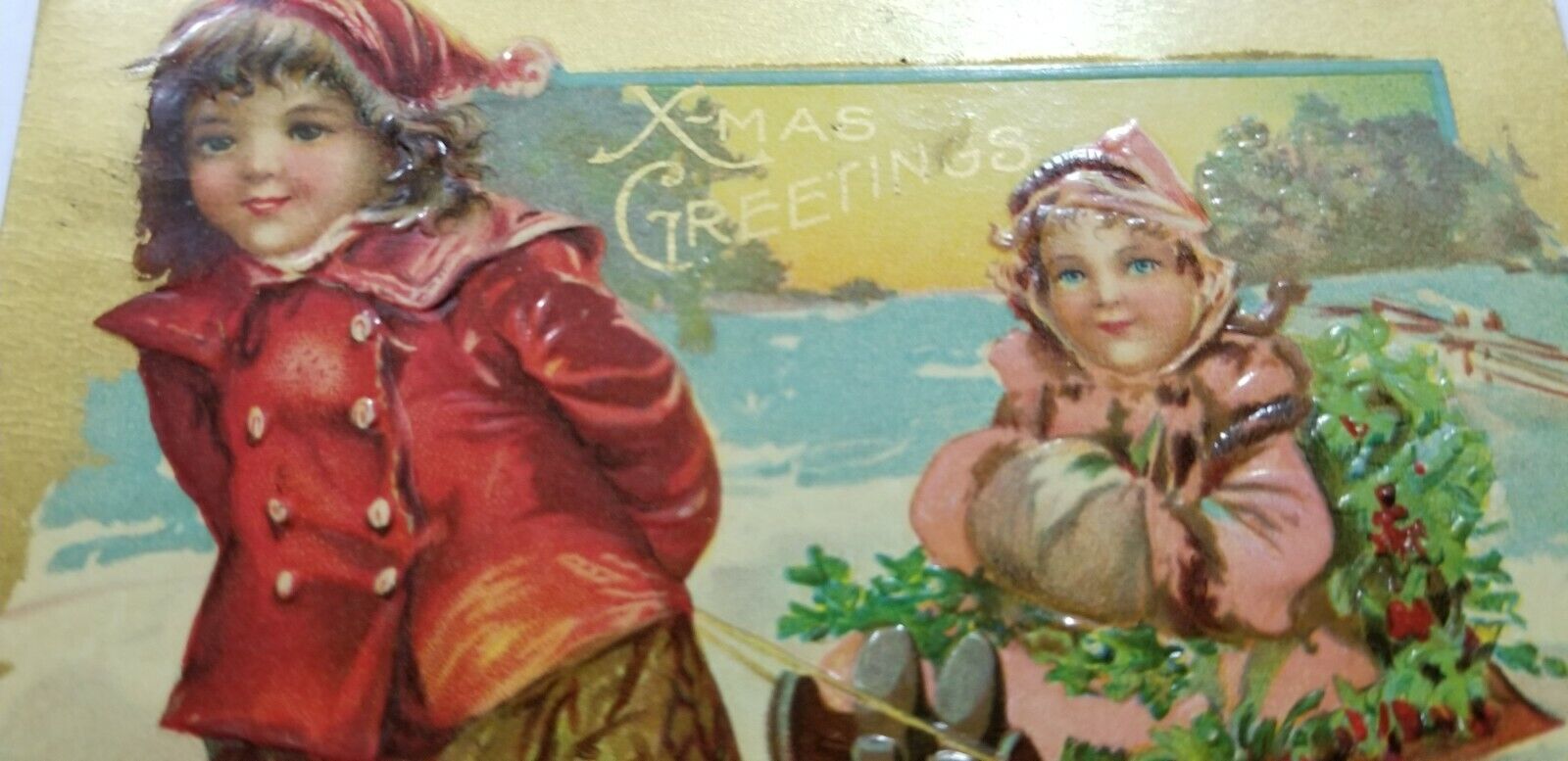 Antique 1909 CHRISTMAS GREETINGS Embossed CUTE KIDS SLEDDING  A4