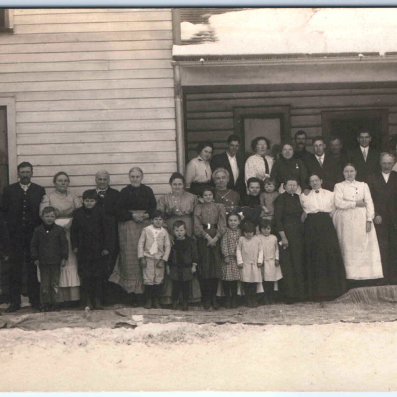 c1910s Outdoor Large Family RPPC House Cute Children Winter Real Photo PC A133