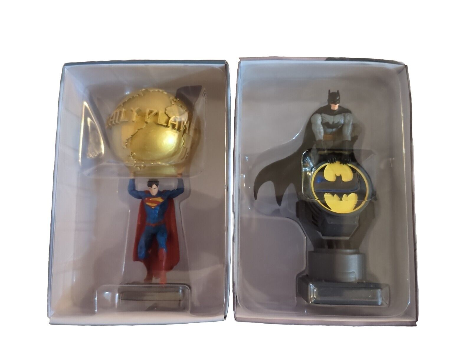 Both Eaglemoss Superman Holding Daily Planet Globe and Batman Bat Signal Figures