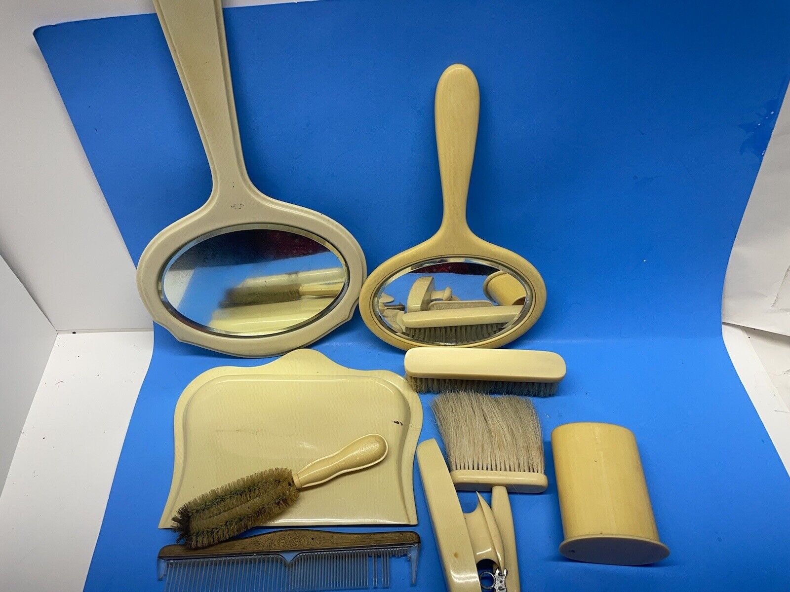 Vintage milk plastic beauty set  of nine tools with two hand mirrors