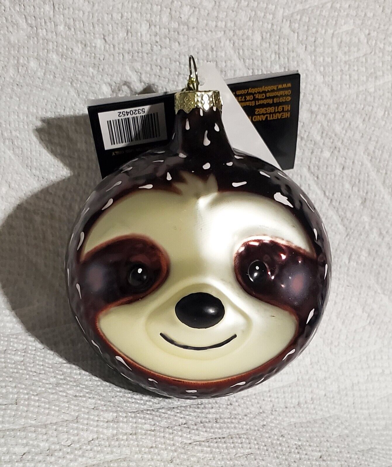 Robert Stanley Blown Glass 2023 Christmas Tree Ornament: Large Sloth Head Ball