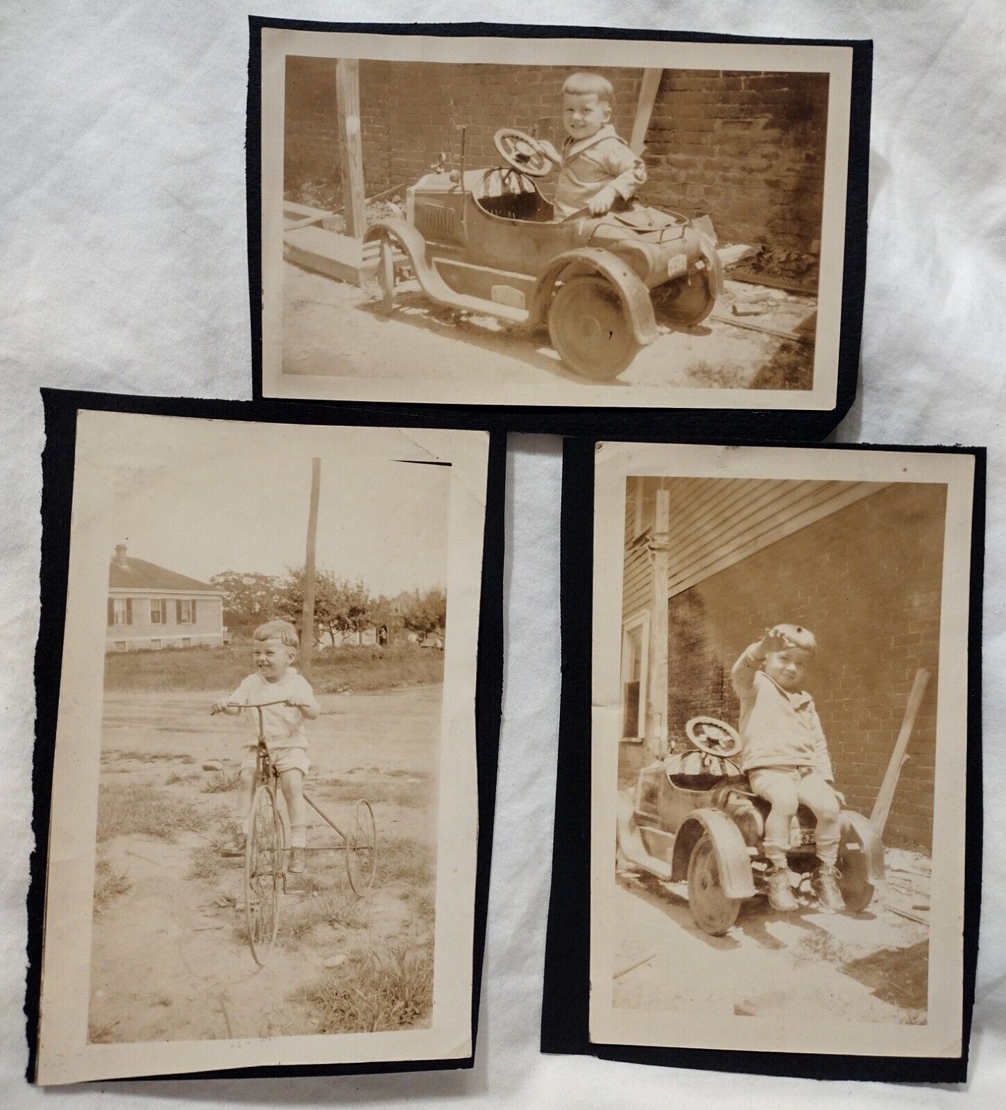 vintage snapshot photo: Boy In Antique Roadster Pedal Car Hot Rod And Tricycle 