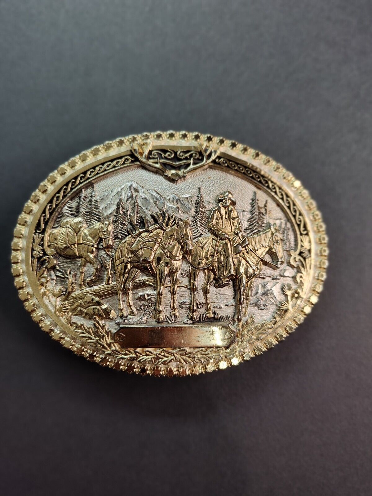 Pack Horses and Rider Brass Heritage Montana Silversmiths Attitude Belt Buckle 