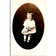 RPPC Child in Dress Sitting Holding Toy with Smiling Vintage Real Photo Postcard picture