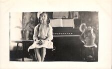 RPPC Young Girl and Organ 1916 Real Photo Postcard picture