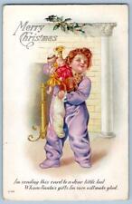 1916 MERRY CHRISTMAS CHILD PURPLE PAJAMAS TOYS BUGLE DOLL TEDDY BEAR POSTCARD picture