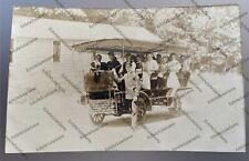 Antique RPPC early stage transport truck bus passengers Real Photo Postcard picture