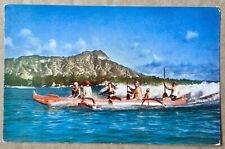 Canoeing off of Waikiki Beach Hawaii Vintage Postcard picture