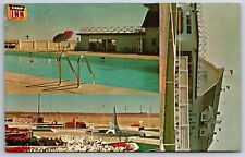 Oakley Kansas~Camp Inns~Swimming Pool~Eiffel Tower~1987 Postcard picture
