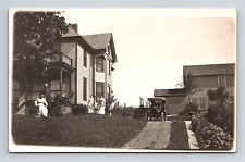 RPPC View of Family Posing by Large House Early Car Women Man Americana Postcard picture