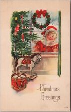 c1910s CHRISTMAS Postcard Boy Peeping Through Window / Xmas Tree & Toys - UNUSED picture