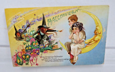 Vintage Embossed Halloween Postcard w/ Witches, Goblins &Father Daughter on Moon picture