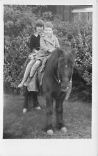 RPPC Smiling Little Boy and Girl on Pony Real Photo Postcard ca. 1927 picture