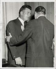 1958 Press Photo John Thomson tries to quiet John McDonough during a meeting picture
