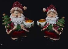 Pair of Santa Claus candlestick holders picture