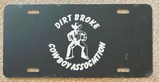 1980's DIRT BROKE COWBOY ASSOCIATION BOOSTER License Plate picture