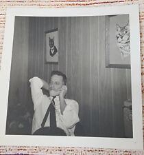 Vintage Black White Snapshot Handsome Man Sitting Using Rotary Dial Phone 1960's picture