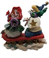 Vintage KMart Snowman and Snowwoman on Sled Snowglobe Figurine picture