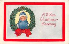 1923 Art Deco Christmas PC-Holly Wreath Frames Child In Stocking Hat, Muff,Scarf picture
