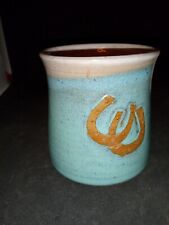 Vintage Red Clay Mug With Horse Shoes picture