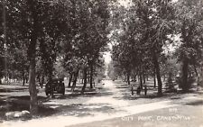 Canby Minnesota~City Park~Cannon in the Trees~Girl on Path~Tractor~1930s RPPC picture