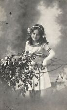 Vintage Postcard Beautiful School Girl In her White Uniform Tree Twig picture