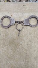 VINTAGE PEERLESS HANDCUFFS WITH KEY  picture