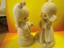 Precious Moments 2 figurine I believe old rugged cross & This day made in heaven picture