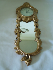 Wall Mirror with Quartz Clock Gold Colored Frame & Glass Lens 18