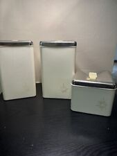 Poly Flex Republic Canister Set Starburst 3 Piece Beige With Silver Lids. Nice picture