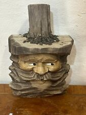 Antique Wood Carving of Bearded Old Man's Face and Tree Trunk picture