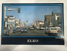 ELKO, NV Nevada ~ STREET SCENE Commercial Hotel Cars Casino Postcard picture