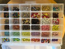 Bundle of Eyelets - Hundreds of Eyelets in  35 different Color and Sizes - Case  picture