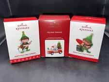 Three Hallmark Keepsake Ornaments Holiday Parade & Two North Pole Tree Trimmers picture