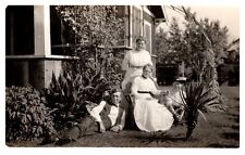 postcard Photo of man in vest laying on ground & 3 other woman RPPC A0858 picture