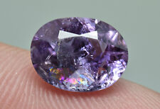Nice Oval Faceted Fluorescent Purple Scapolite Gemstone w/ Dispersion1.70 Carat picture