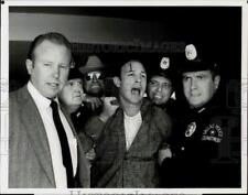 1980 Press Photo Police Arresting Man in 