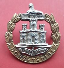 Dorsetshire Regiment genuine WW2 Military Cap Badge - bi-metal with lugs picture