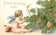 Embossed Tuck Christmas Postcard Cherub Tugs On Branch With Candles and Walnuts picture