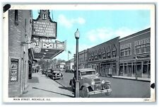 1939 Main Street Exterior Building Classic Cars Road Rochelle Illinois Postcard picture