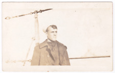 WW1 WWI Era Sailor Overcoat Hat Stern Looking On Deck Steel Cables RPPC Postcard picture